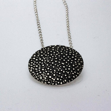 black dotted pendant