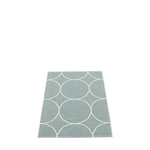 Woven rug with circles vanilla/haze