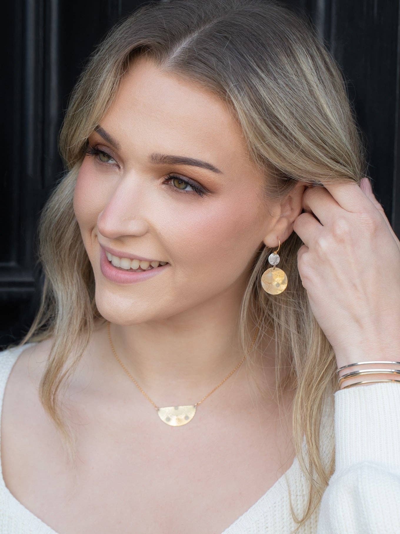Side view of the radiant Danica Earrings, showcasing their 18K gold-plated brilliance that could make even a supernova jealous!