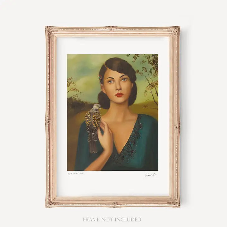framed portrait of a woman holding a bird