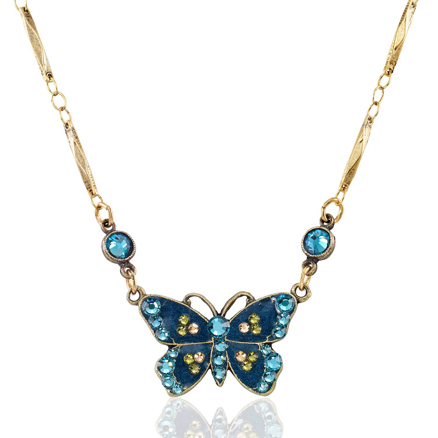 Teal Artisanal Golden Accented Butterfly Crystal Necklace featuring a rich teal hand enameled butterfly pendant, adorned with sparkling teal and golden crystal embellishments, on an antiqued brass chain.