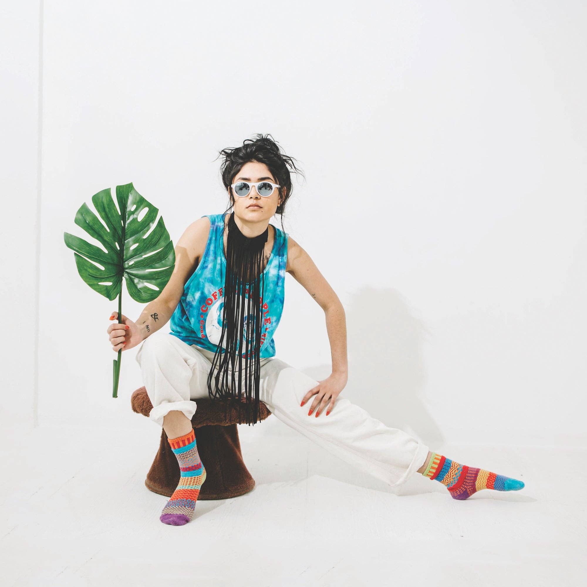 Cosmos Crew Socks displayed in a playful arrangement, highlighting the fun colors and cheerful design perfect for adding personality to everyday wear.