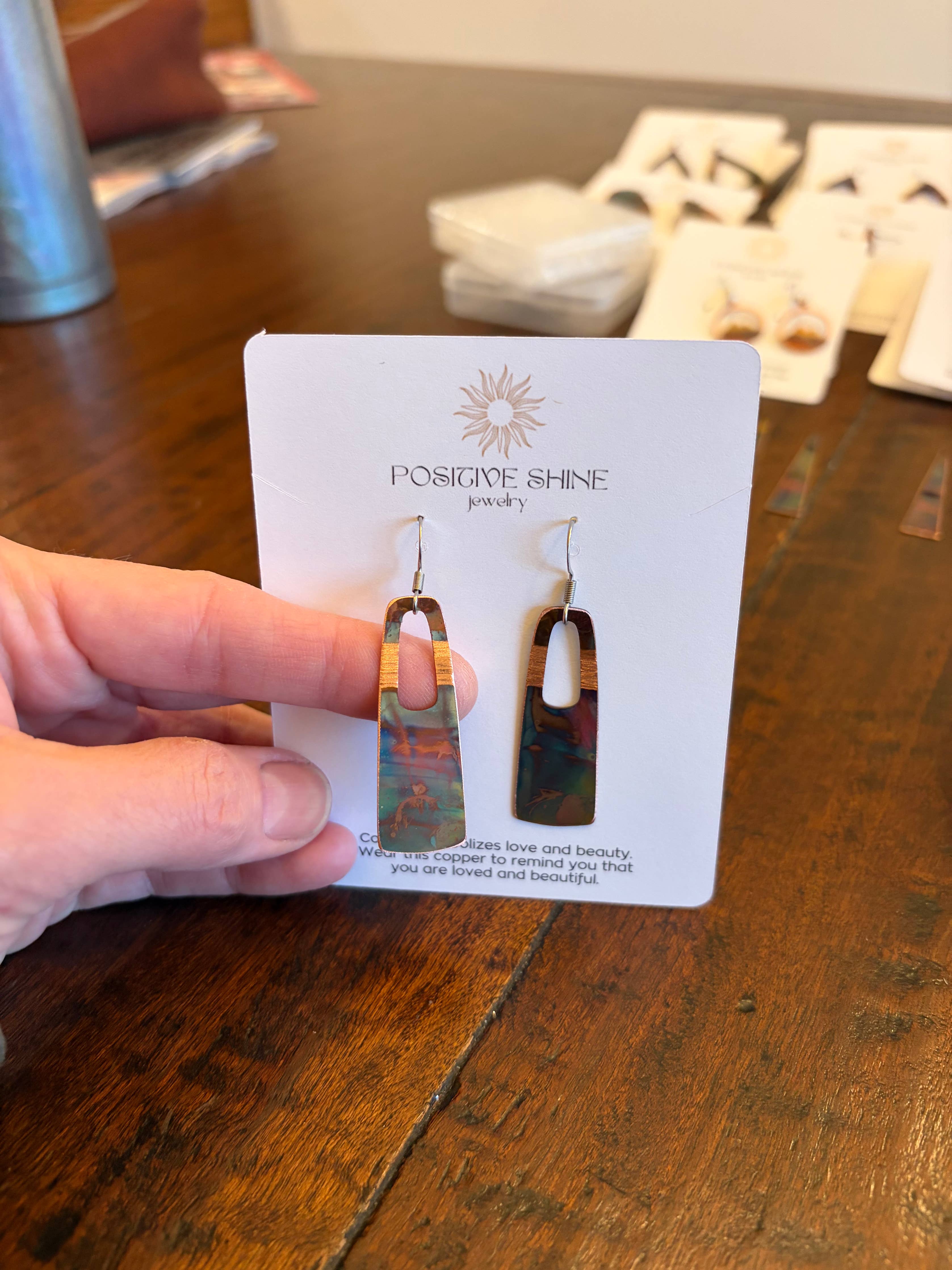 Copper fire painted rectangle earrings with hole, featuring vibrant hues, artisan-crafted design, and lightweight for comfortable all-day wear.
