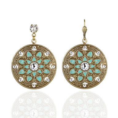 Pair of ornate earrings with turquoise and gold design with gemstones