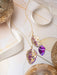 Lifestyle image featuring Eccentric Elm Earrings by Holly Yashi, making a statement at a casual brunch; because even your earrings deserve to enjoy a mimosa!