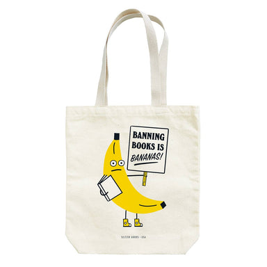 Banana Books Tote from Seltzer Goods featuring a playful banana character holding a book with the text 'Banning Books is Bananas!' in a witty design, perfect for carrying your favorite reads.