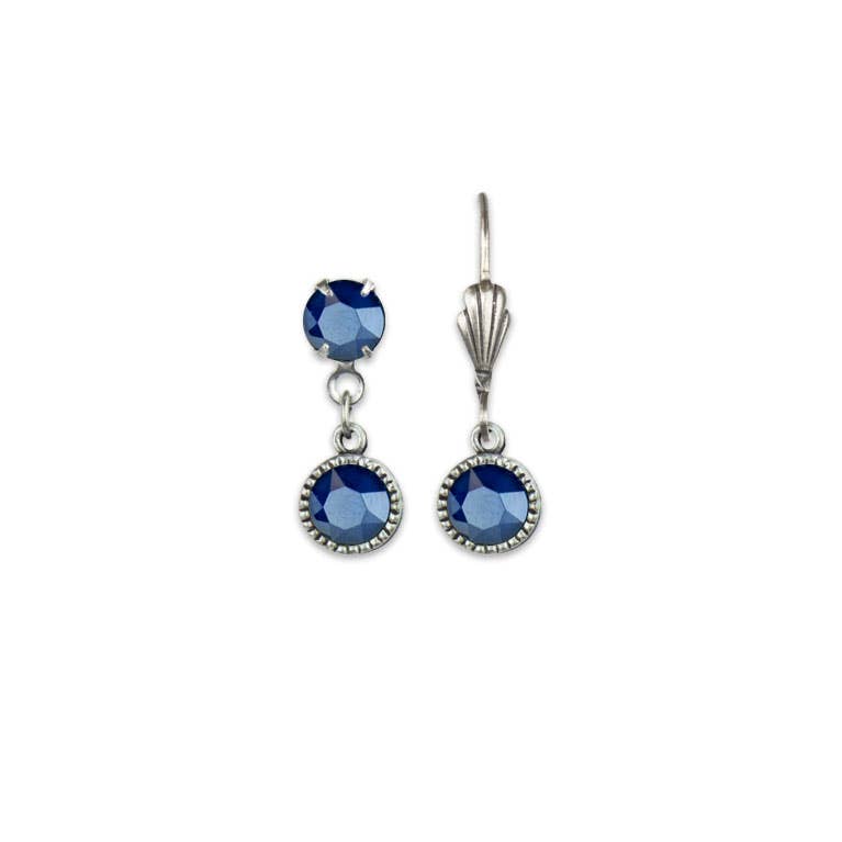 Pair of silver drop earrings with blue gemstones