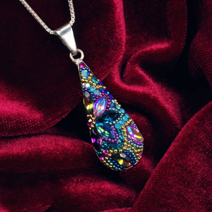 Model wearing the Morning Drop Pendant, illustrating its perfect fit and understated elegance for any occasion.