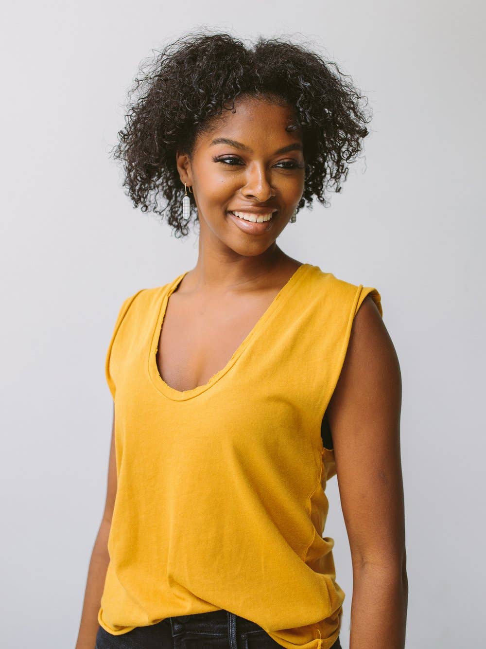 woman wearing glazed pinstripe earrings