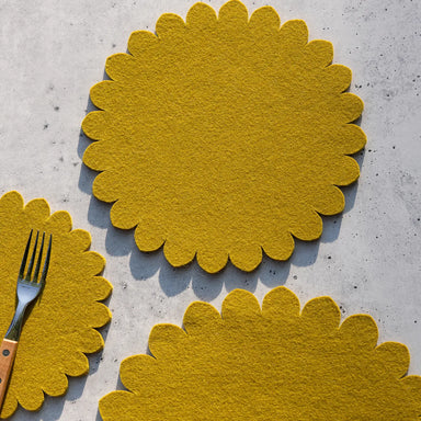 Crest Merino Wool 10" Trivet featuring traditional Japanese floral crest patterns, showcasing sustainable and luxurious Merino wool for kitchen protection.