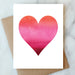 Valentine's Day card featuring a gradient heart design in pink hues, created by ARTISANS & agency.