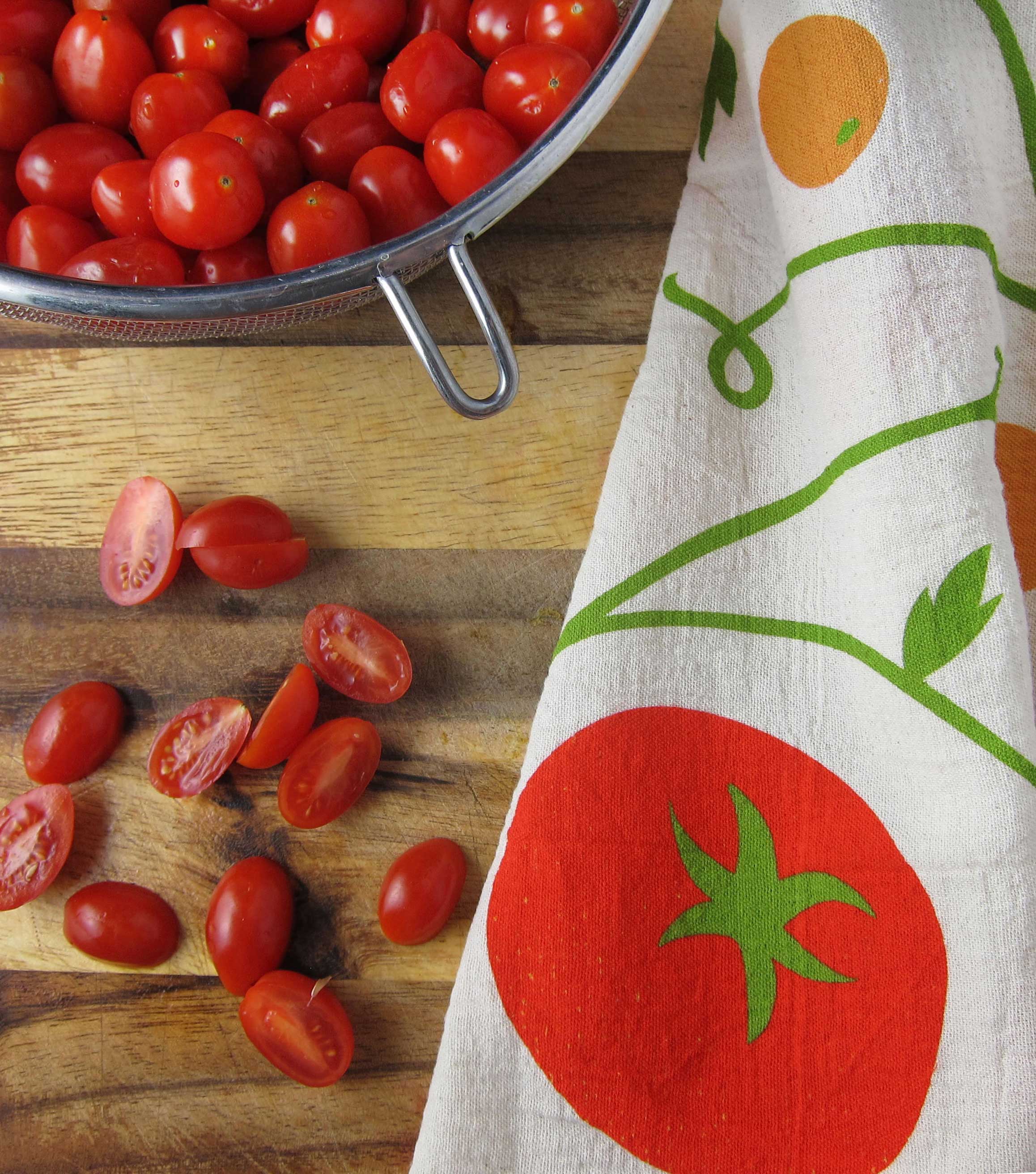 Tomato Basil Tea Towel Set of 2 displayed in a compostable container, ideal for gifting or home use.