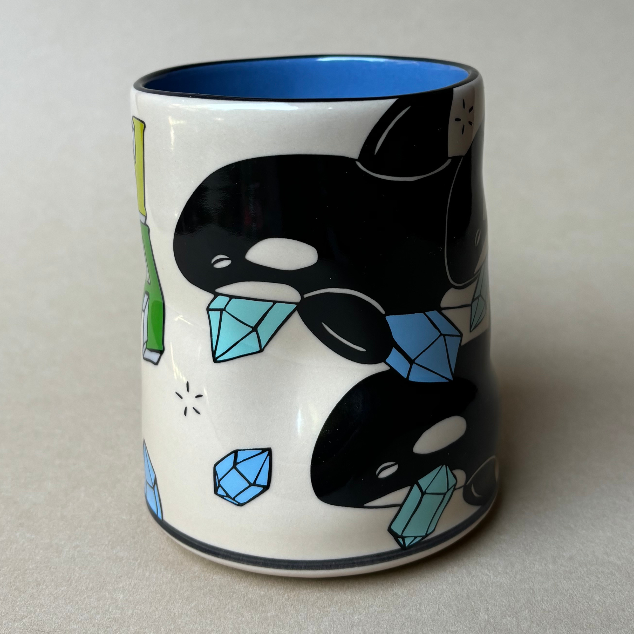 Multiple Orca ceramic cup
