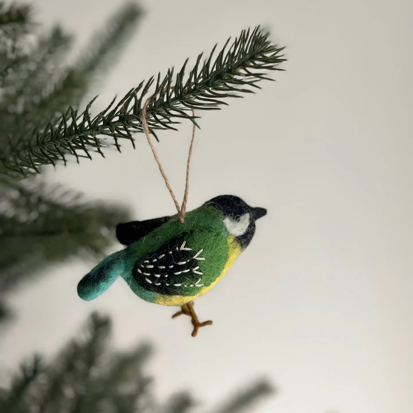 Handmade Felt Bird Ornaments showcasing delightful designs, ideal for festive holiday decorating.