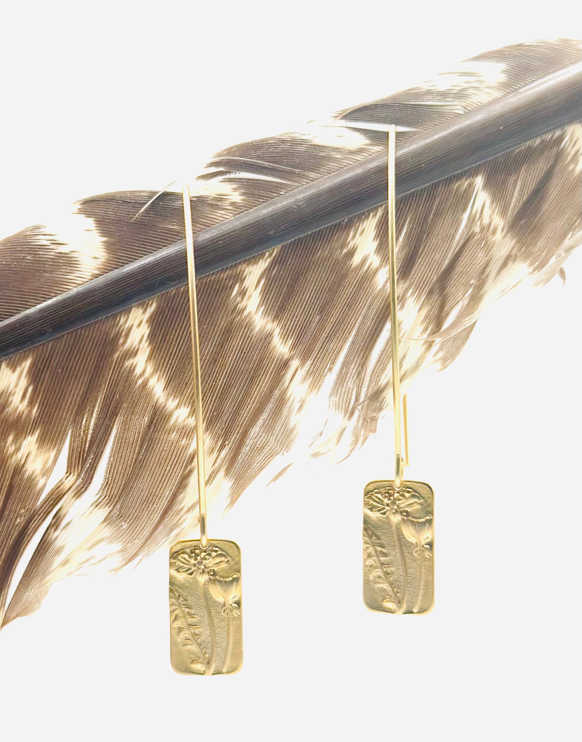 Wildflower Golden Dangles by Suzanna Garrett Designs — a tiny wildflower is sometimes all an earring needs
