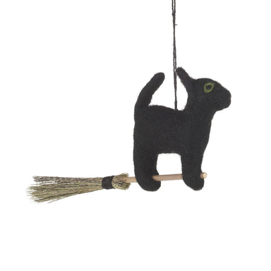 cat with a broom ornament