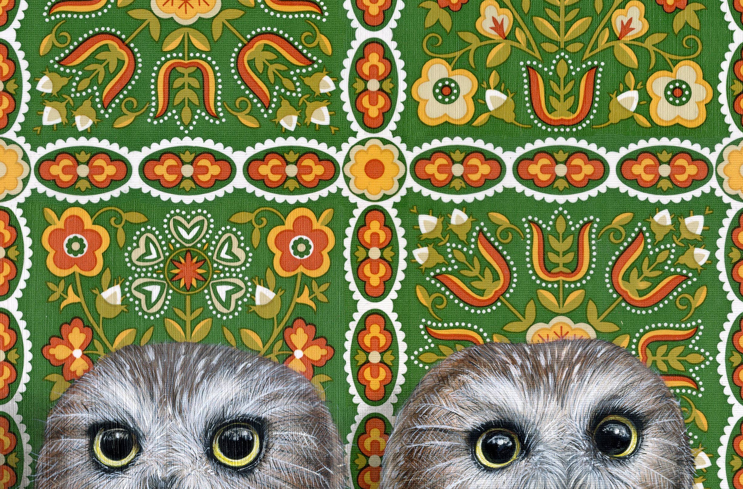 Framed art print of two owls on a patterned background.