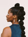 Close-up profile shot of a woman adorned with Skinny Dip Earrings by Twenty Two West, highlighting her stylish look and elegant ear embellishments.