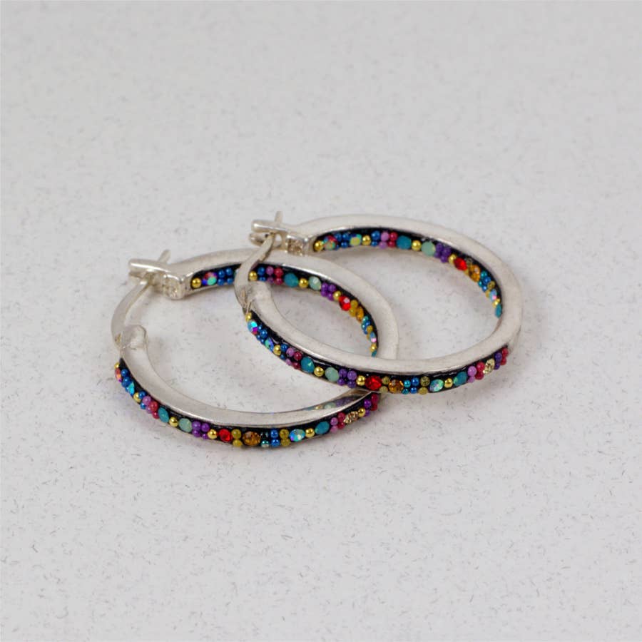 Extra large hoop earrings by Mosaico Jewels featuring sparkling crystals and silver design, perfect for adding elegance to any outfit.