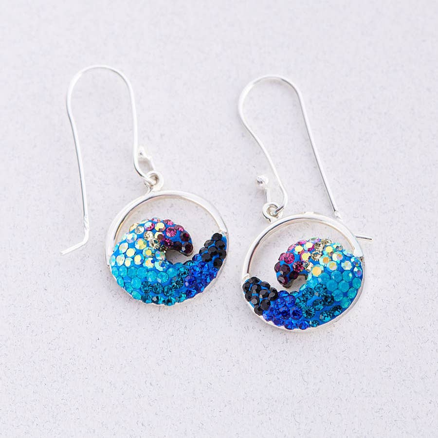 Mosaico Jewels Free Wave Earrings featuring a stunning crystal and silver design, symbolizing strength and beauty.