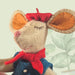 Little Mouse in Paris Felt Craft Mini Kit completing her shopping with a freshly baked baguette and croissant, ready to delight visitors.