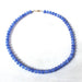 The Cornflower Stone Candy Beaded Necklace by The Silver Wren displayed on a white background, highlighting the beautiful jade stones in varying shades of blue.