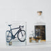 whiskey glass with black bicycle print