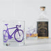whiskey glass with purple bike print