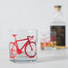 whiskey glass with red bike print