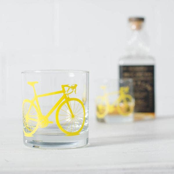 whiskey glass with yellow bicycle print