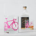 whiskey glass with pink bicycle print