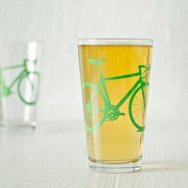 pint glass with green bike