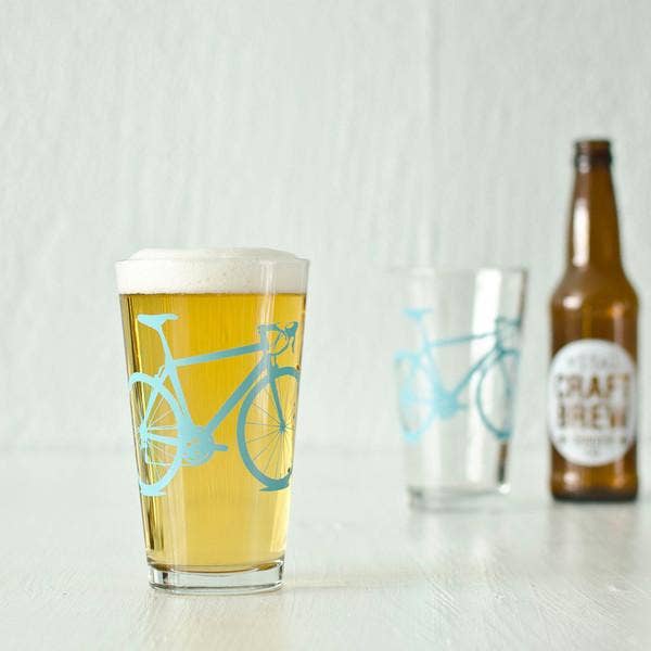 pint glass with blue bike