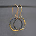 Small Steel and Gold Hoops: industrial chic with a sprinkle of sparkle, perfect for those who want to dazzle without the heavy metal vibe!