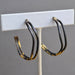 Small Wavey Steel & Gold Hoops that look like they danced with metal and got a gold leaf suntan - perfect for bringing a touch of shimmering fun to your ears!