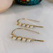 Mini Pearl U Shaped Threader Earrings making a stunning entrance, just like your favorite diva at a red carpet event.