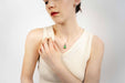 Close-up of the Mermaid Tear Necklace showing the natural sea glass and sterling silver craftsmanship.