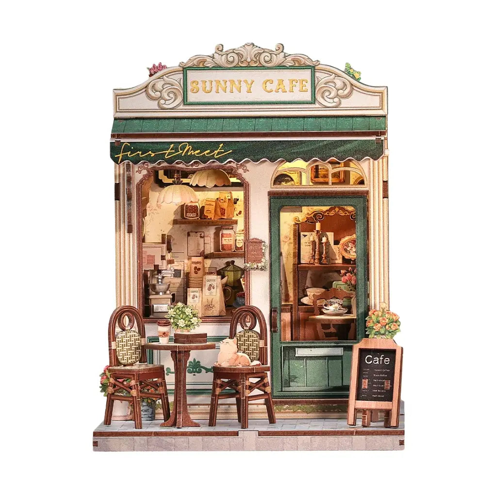 DIY Miniature Book Nooks by Hands Craft - Sunny Cafe model with detailed exterior, featuring outdoor seating and a charming facade, perfect for book lovers.