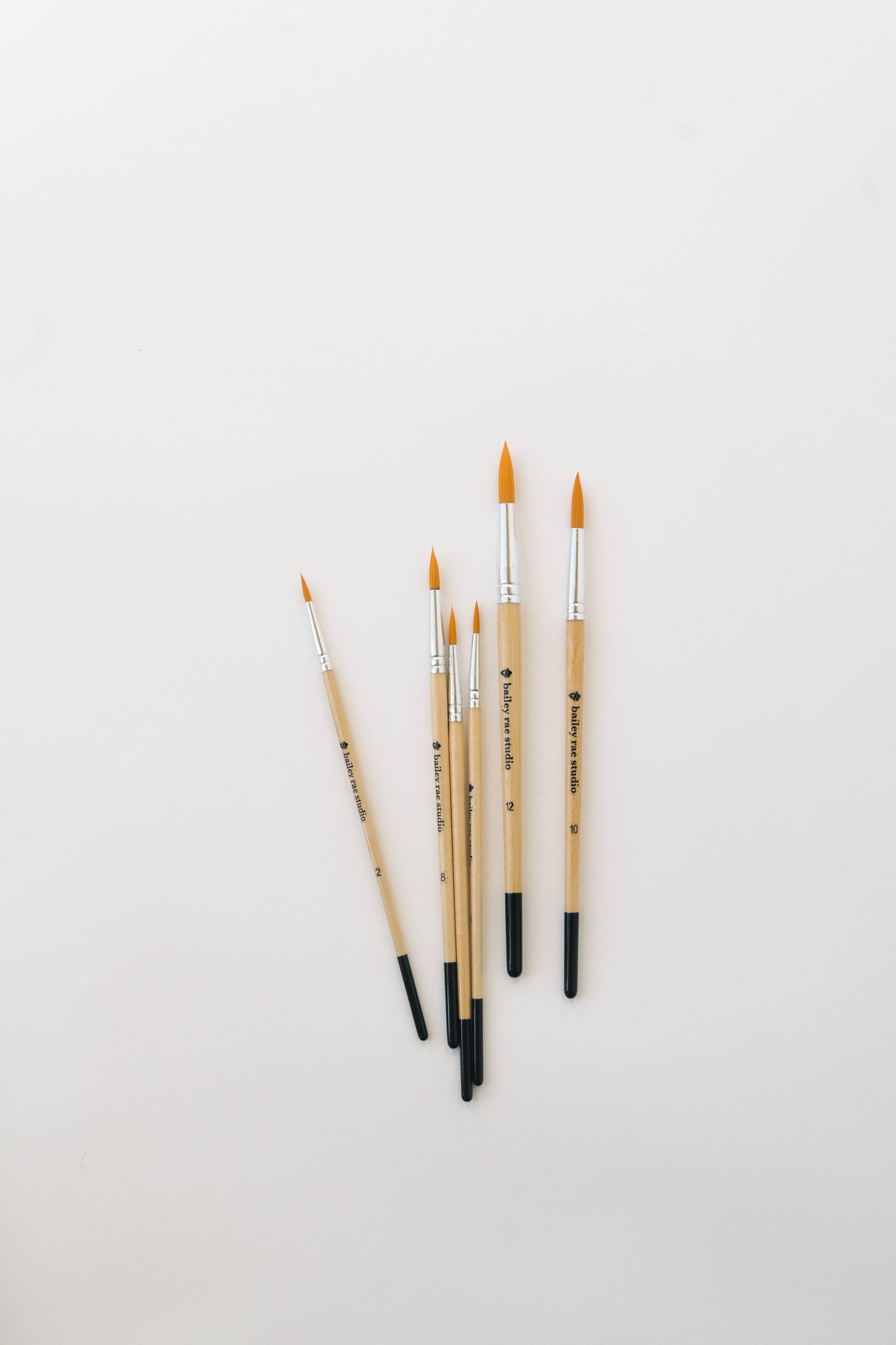 Watercolor painting in progress using the Round Tip Watercolor Brush Set - 6 piece, showcasing blending techniques.