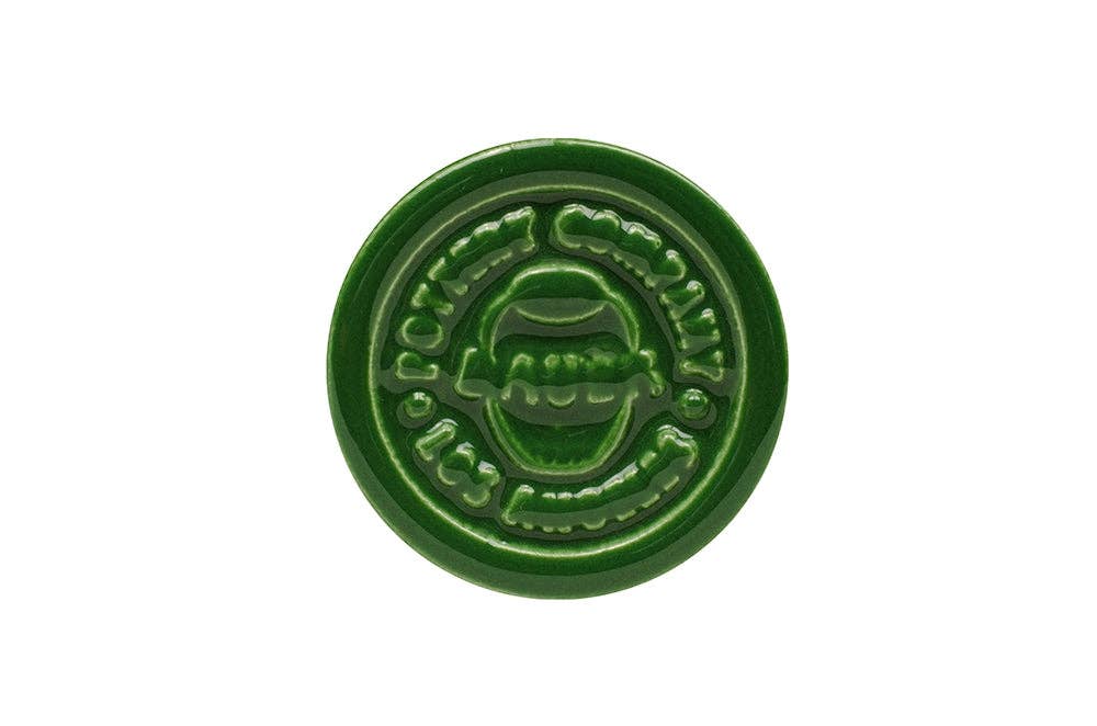 Green ceramic stamp with Bauer Pottery Company