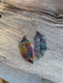 Western Feather Copper Earrings showcasing unique fire-painted designs with multiple colors and patterns.