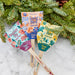 Three vibrant Modern Sprout Pollinator Seed Pops, featuring Butter Fly, Song Bird, and Humble Bee designs, perfect for starting a pollinator garden.