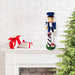 The 14” Master of the Lighthouse Nutcracker on a mantel, making sure not to wave at the neighbors while guarding the holiday cheer!