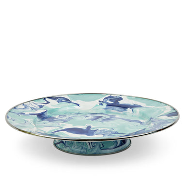 Crow Canyon Home Enamelware Lagoon Cake Plate featuring a captivating marbled design in cobalt blue and sea glass colors, measuring 12.5 inches in diameter.