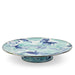 Crow Canyon Home Enamelware Lagoon Cake Plate featuring a captivating marbled design in cobalt blue and sea glass colors, measuring 12.5 inches in diameter.