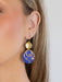 Close-up of Atlas Earrings showing intricate constellation artwork and niobium sphere, ready for your next interstellar adventure!