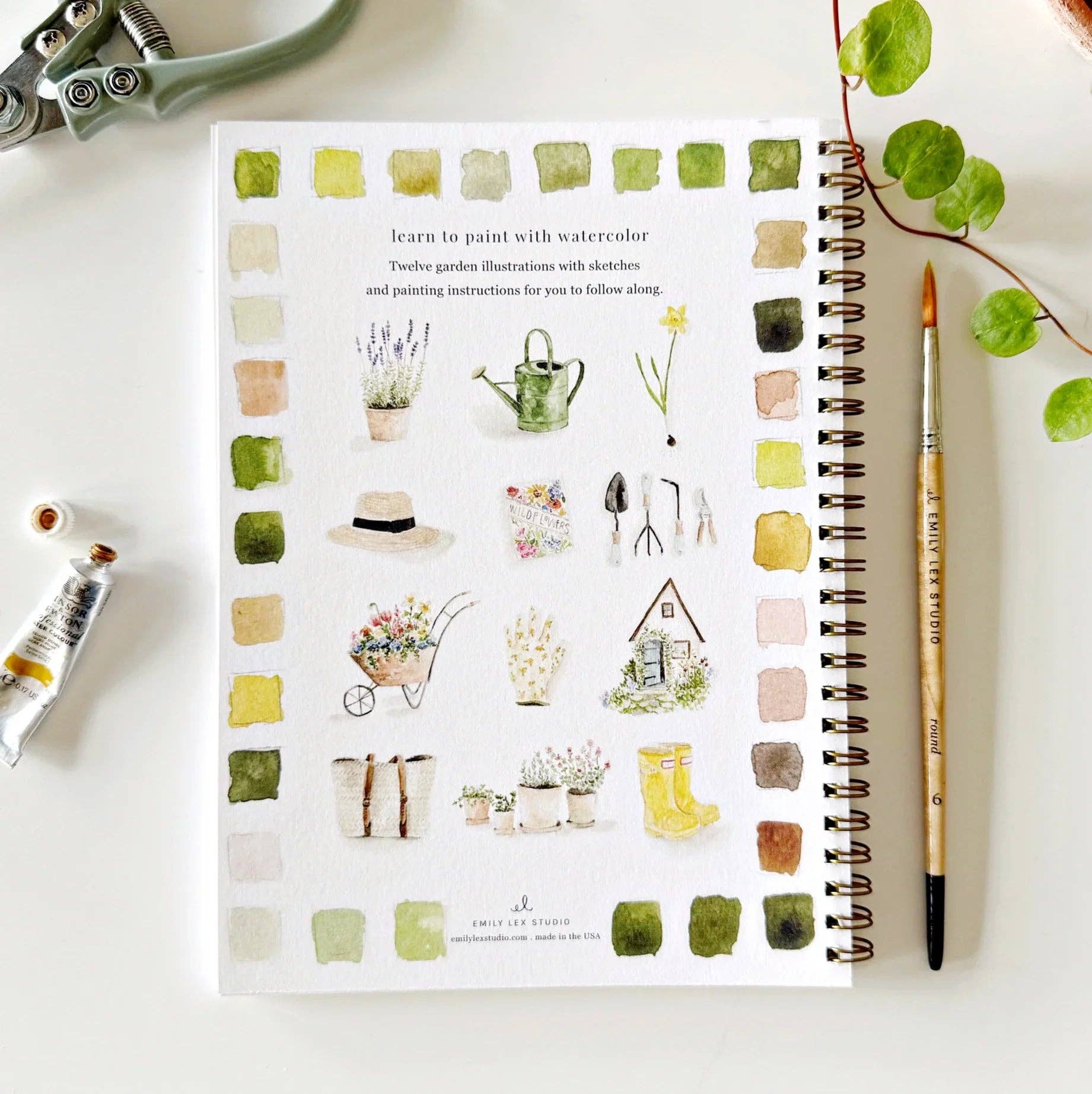 Cover of the Garden Watercolor Workbook featuring colorful flower illustrations suitable for kids and adults.