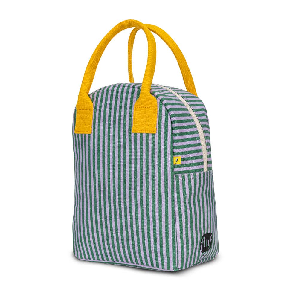 Green and white striped lunch bag with yellow handles 