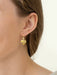 Budding Heart Earrings showcased with style - handcrafted by Holly Yashi, these earrings are the perfect mix of poetry and playfulness, complete with gold fill and niobium!