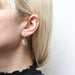Small Cutout Rounded Triangle with Hanging Disc Wire Earrings by Marjorie Baer, handcrafted jewelry made in California